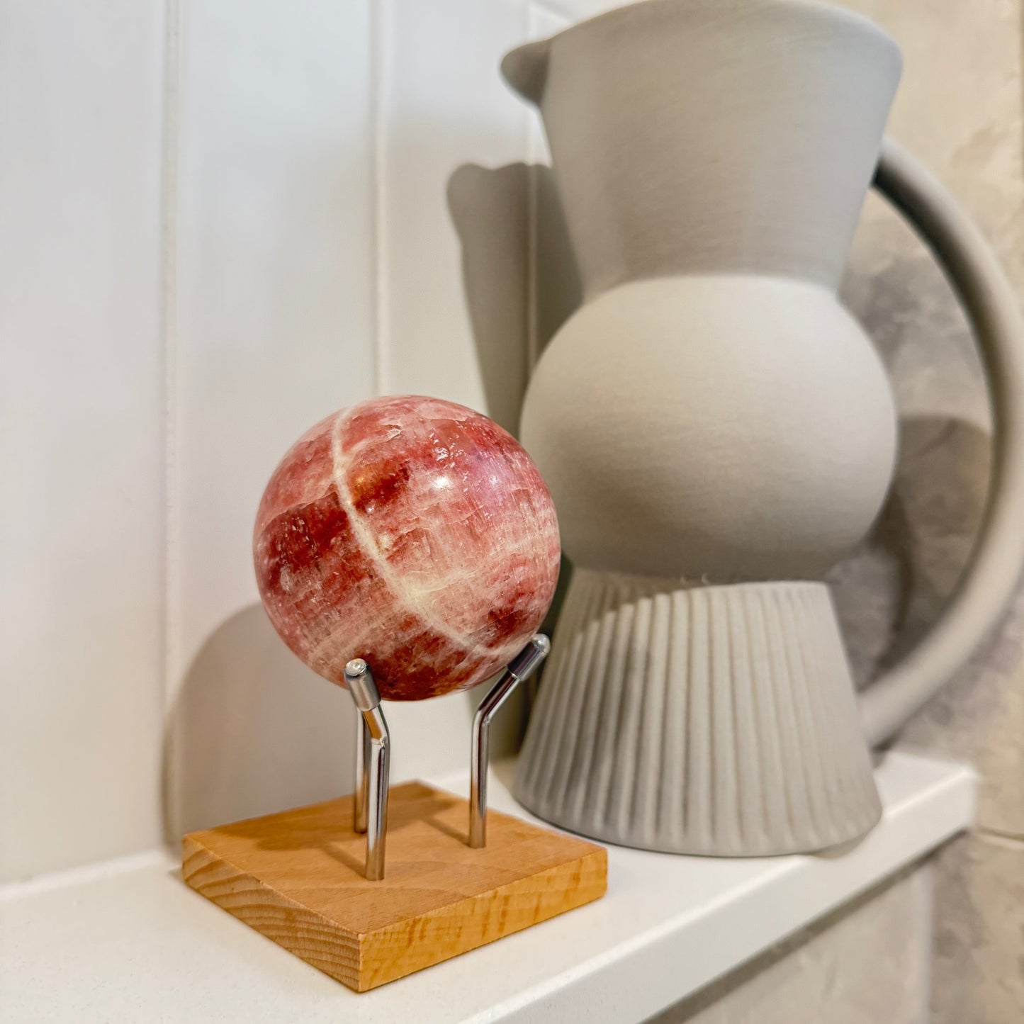 Rose calcite sphere 65mm 500grams