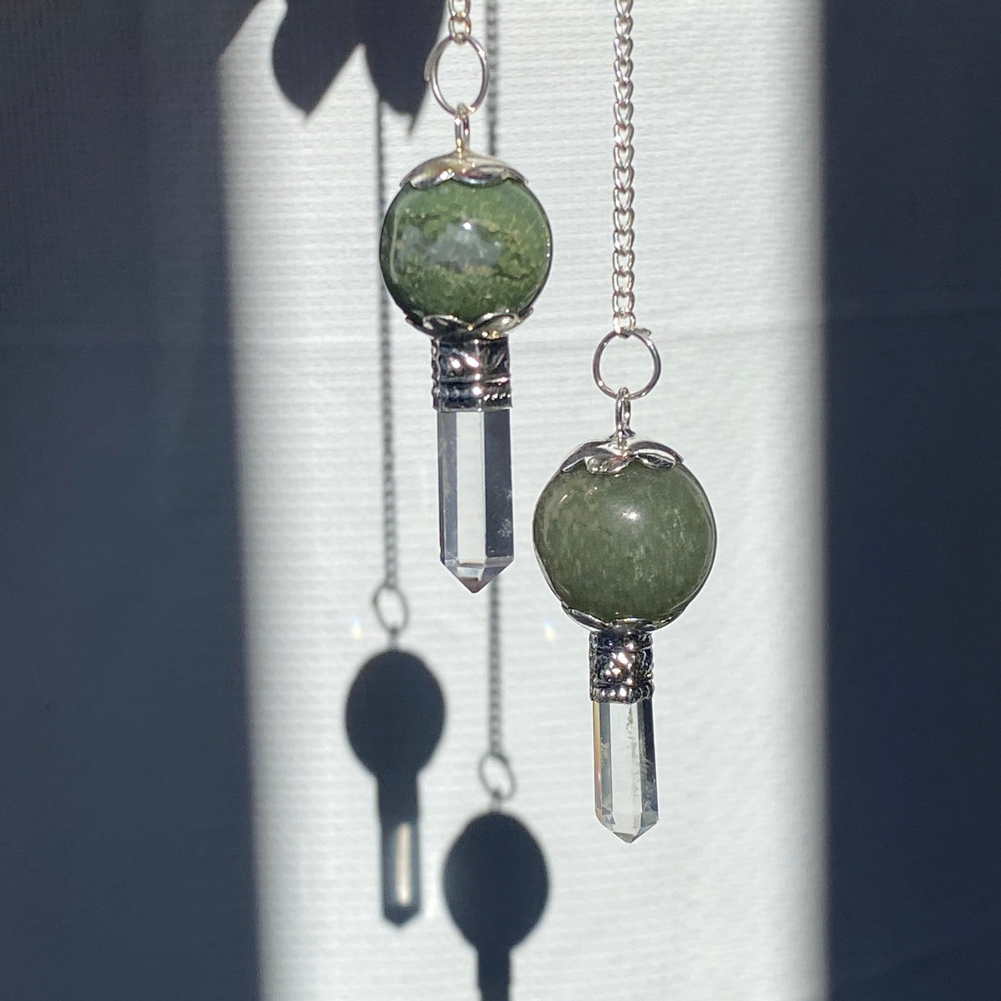 Moss Agate pendulum with quartz point