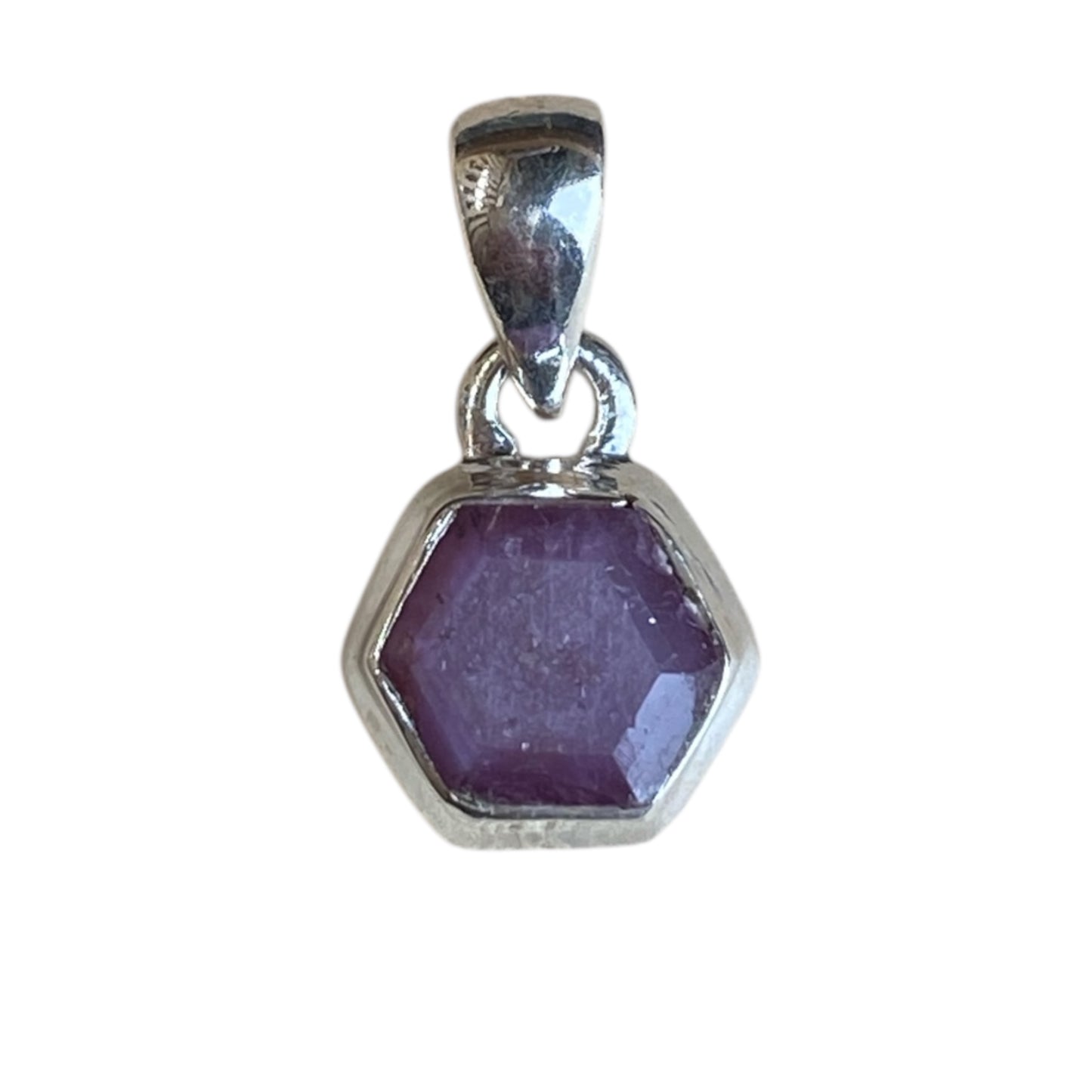 Ruby star sterling silver pendants in claw and bezel settings