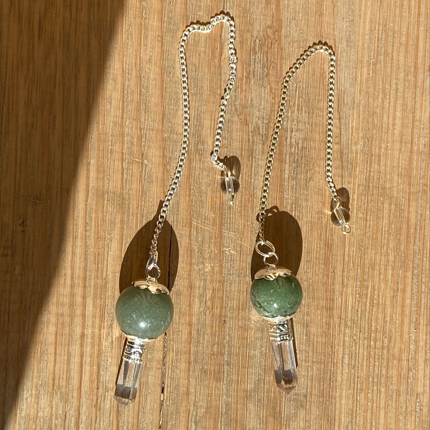 Moss Agate pendulum with quartz point