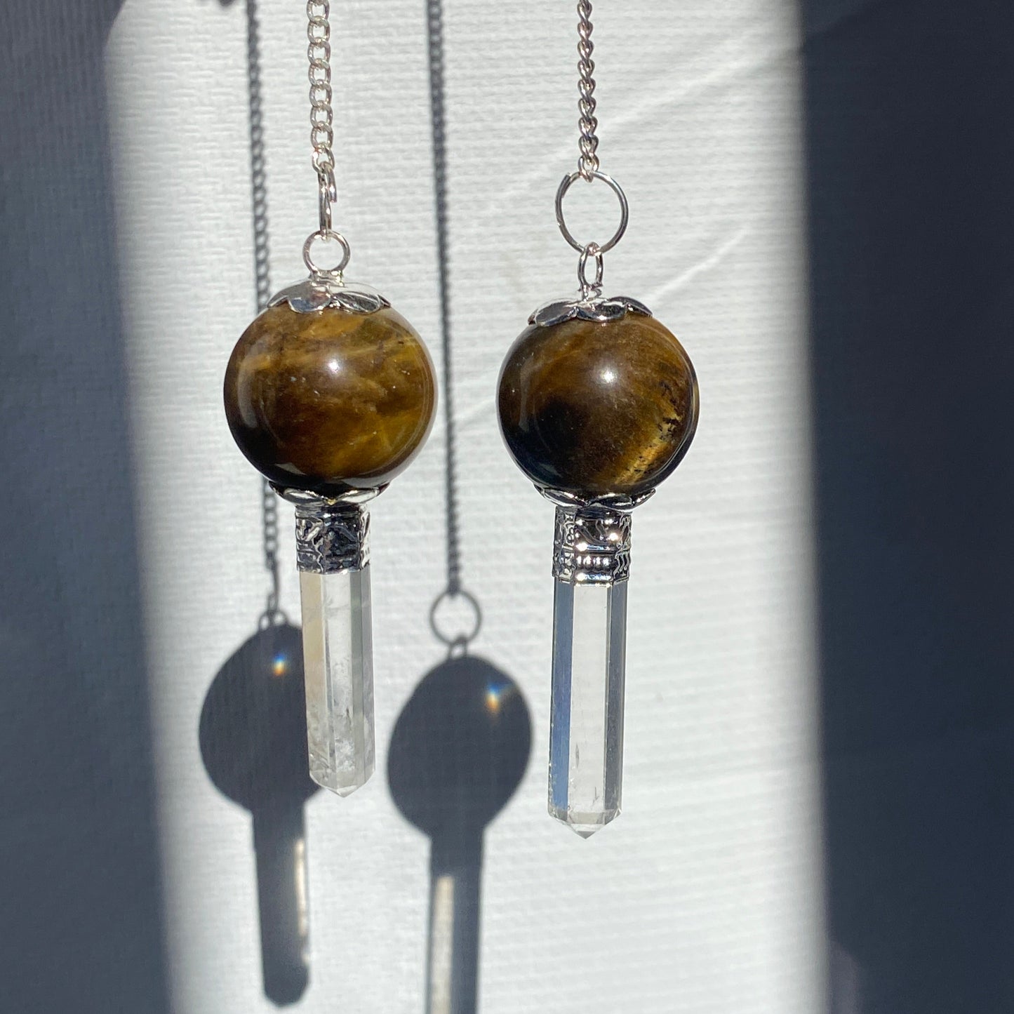 Tiger Eye pendulum with quartz point