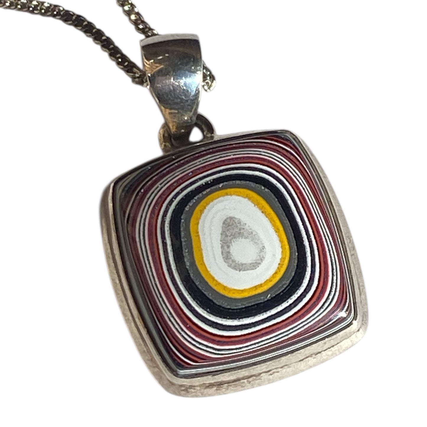 Fordite sterling silver pendant