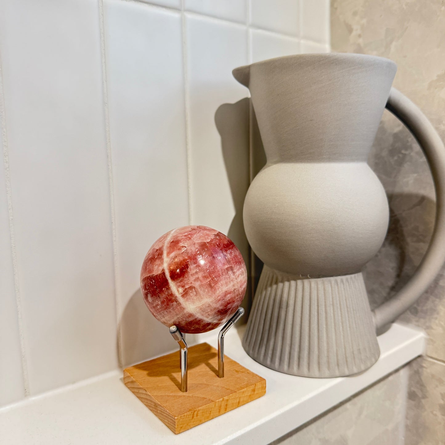 Rose calcite sphere 65mm 500grams