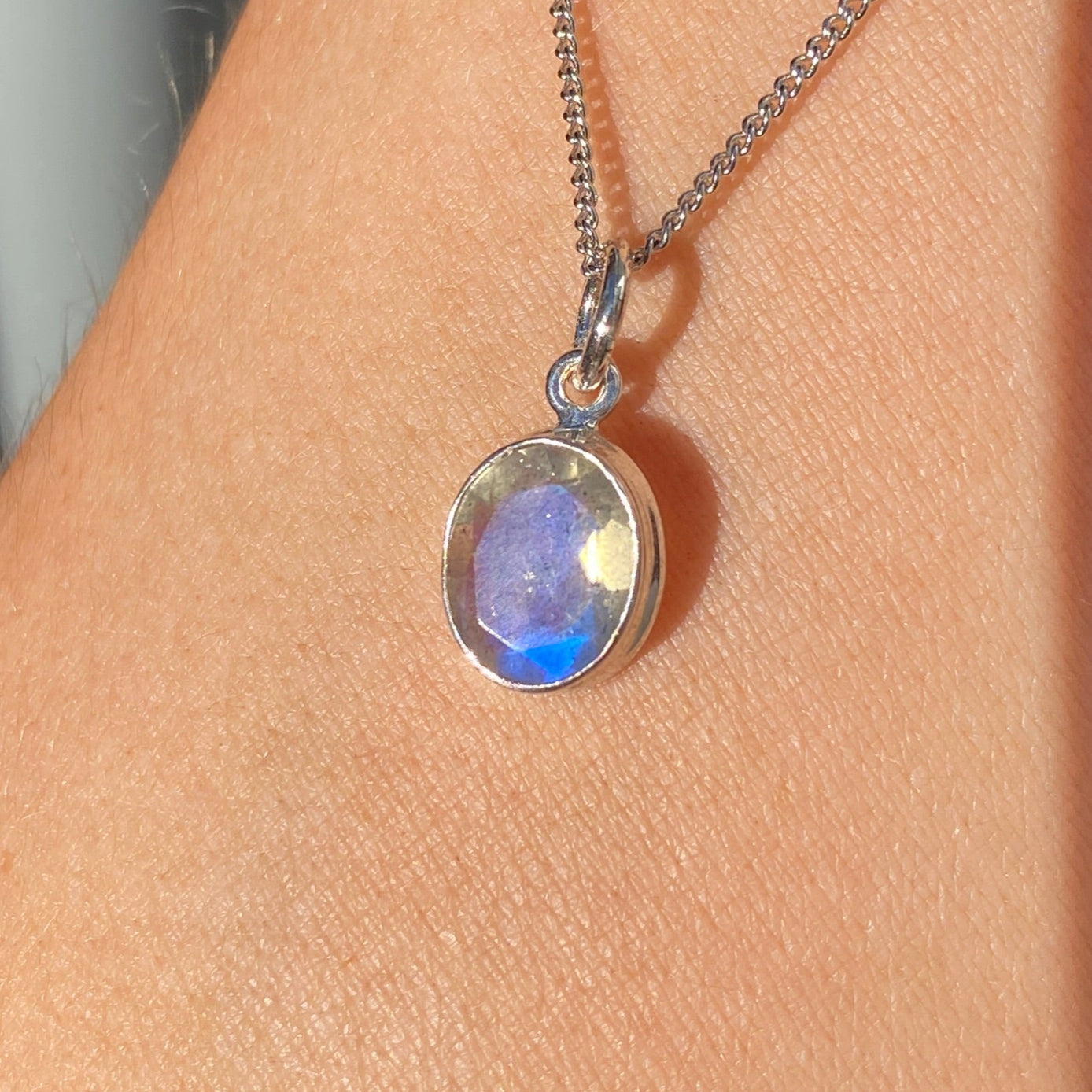Blue fire Labradorite pendant 8x10mm faceted sterling silver