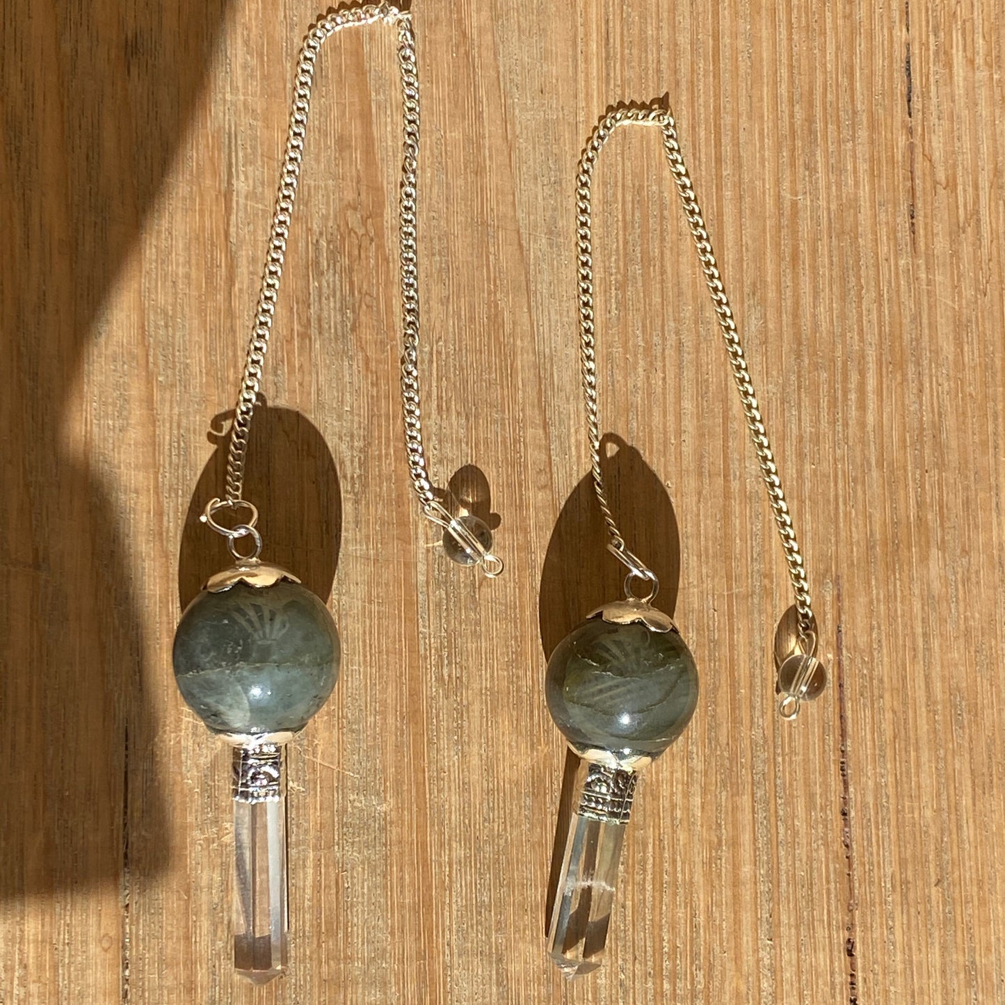 Labradorite pendulum with quartz point