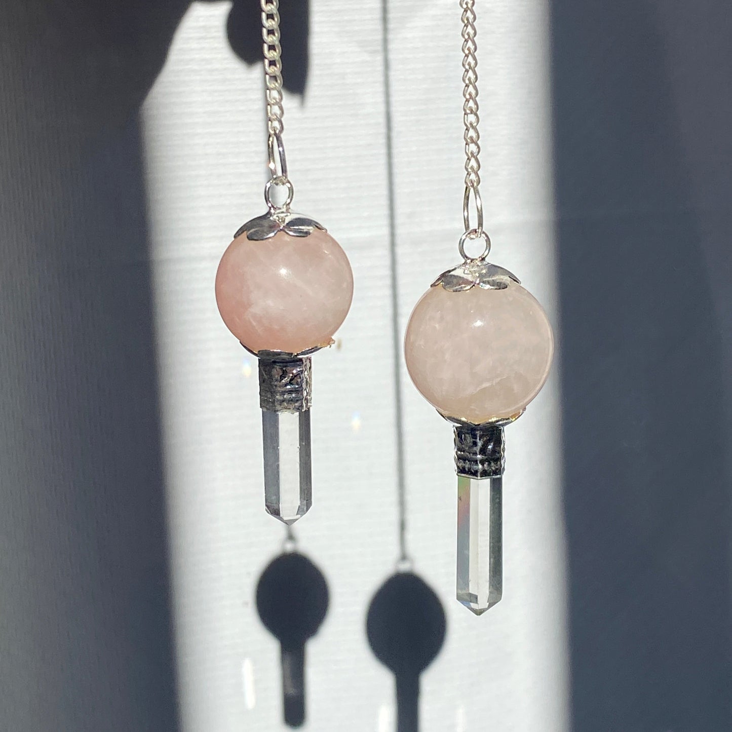 Rose Quartz pendulum with quartz point