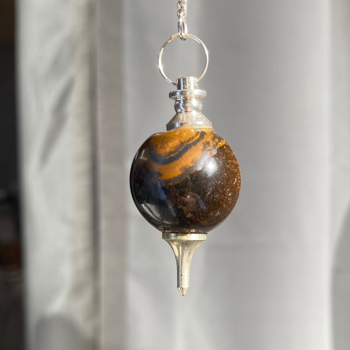 Tiger eye pendulum