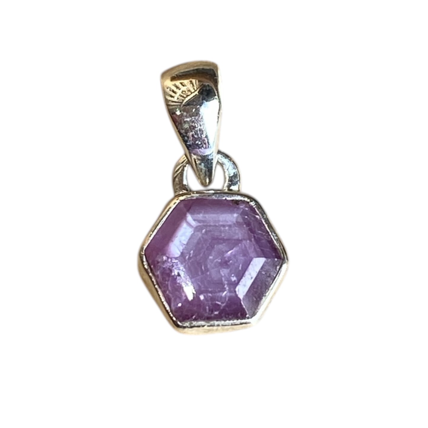Ruby star sterling silver pendants in claw and bezel settings
