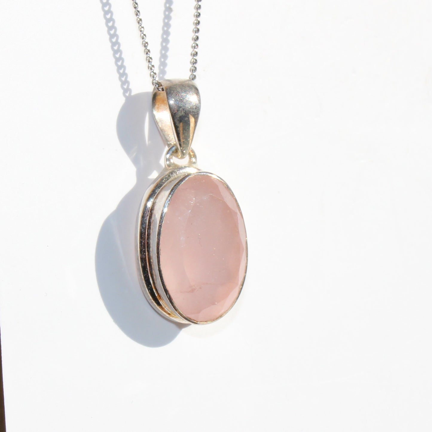 Rose quartz pendant sterling silver oval faceted silver