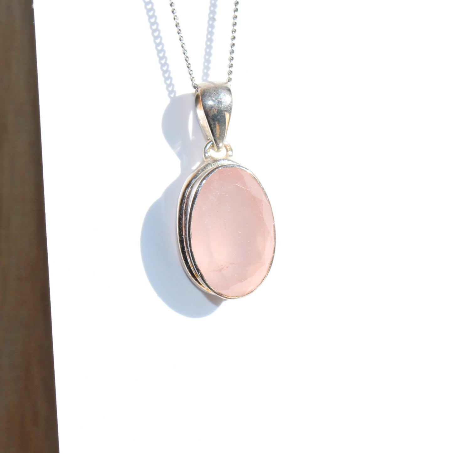 Rose quartz pendant sterling silver oval faceted silver