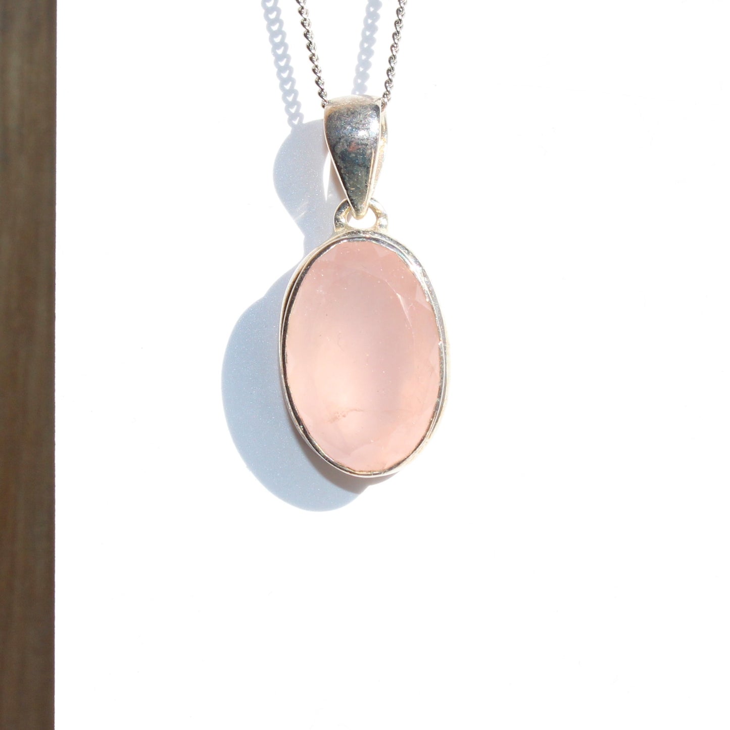 Rose quartz pendant sterling silver oval faceted silver