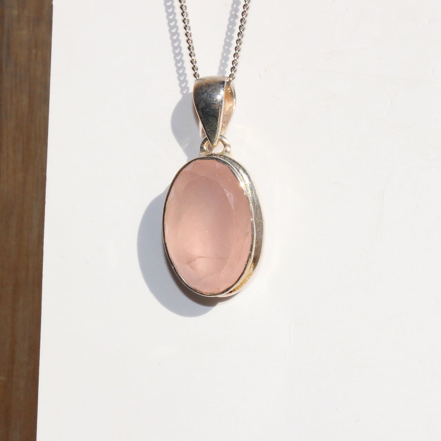 Rose quartz pendant sterling silver oval faceted silver