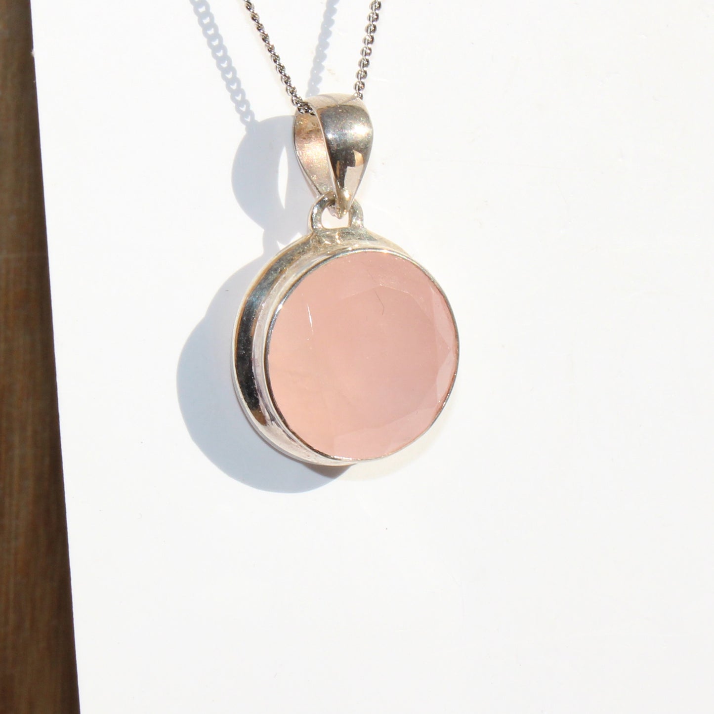 Rose quartz pendant sterling silver round faceted silver
