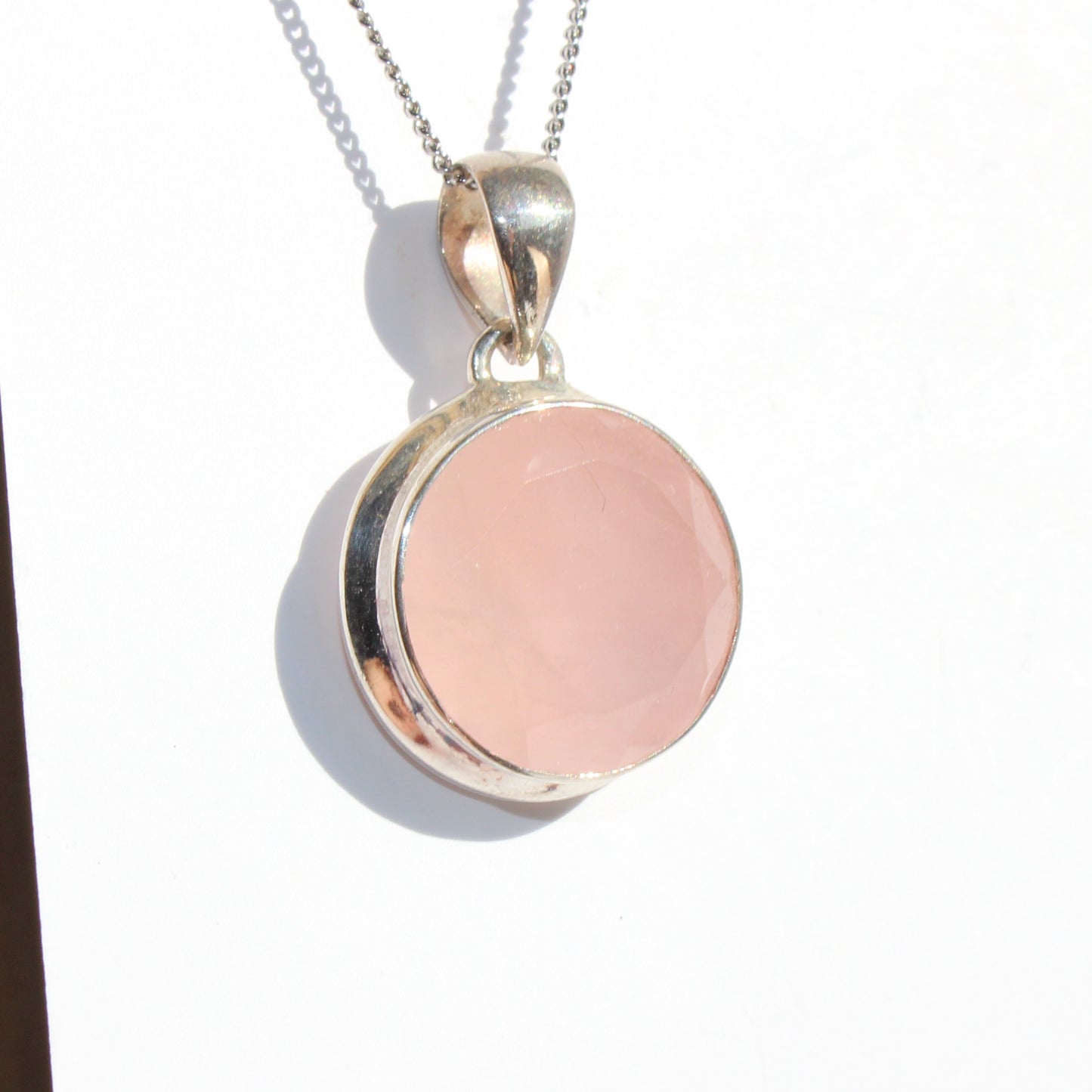 Rose quartz pendant sterling silver round faceted silver