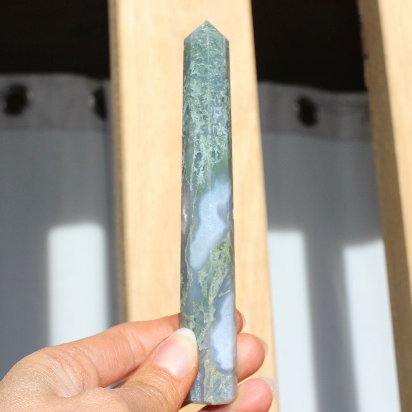 Moss agate tower with druzy inclusions