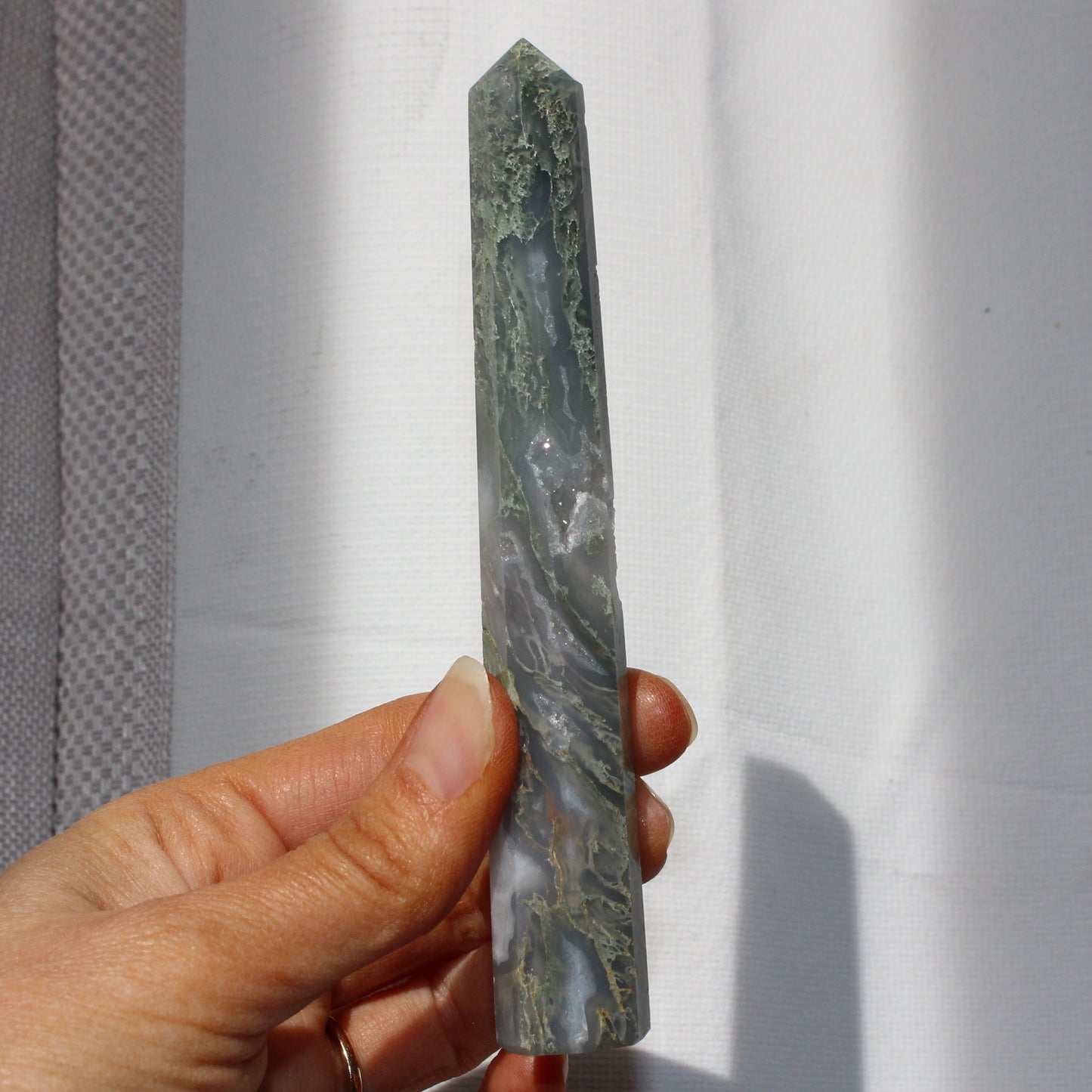 Moss agate tower with druzy inclusions