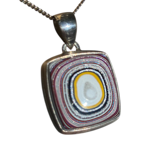 Fordite sterling silver pendant