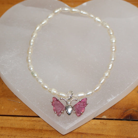 Seed pearl bracelet with pink tourmaline butterfly set in sterling silver